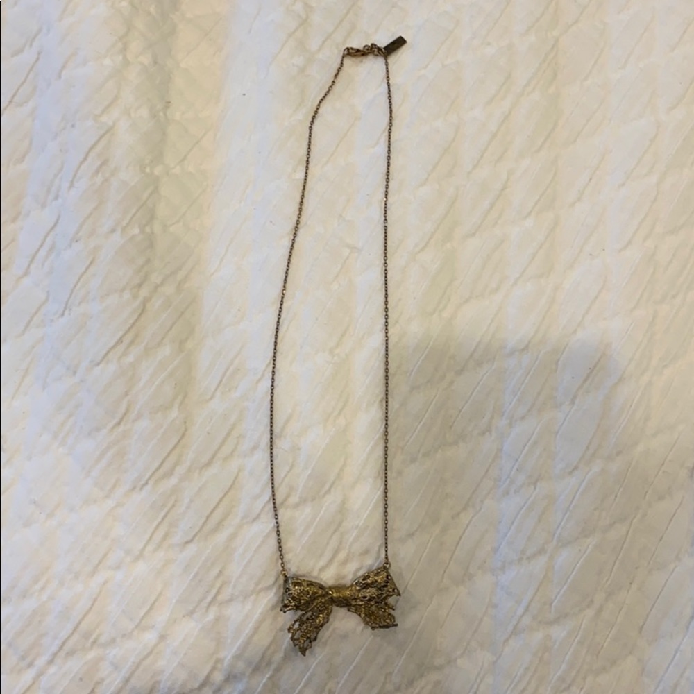 Gold bow necklace
